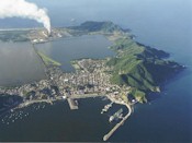 Manzanillo, and the power plant spewing pollution