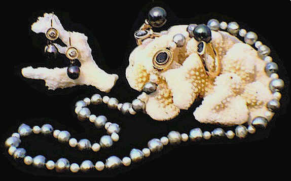 Black pearls set in gold by a local artist