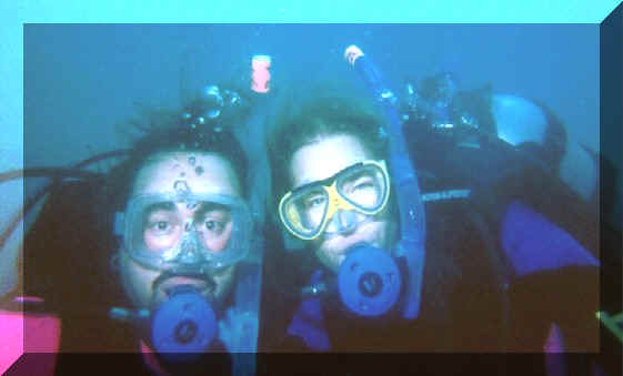 A couple enjoying their first dive in Manzanillo